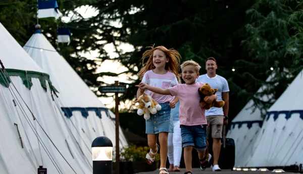Excited children glamping